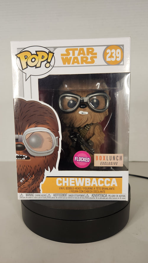 Funko Pop! Chewbacca figure packaging on a gray background